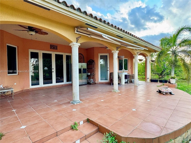 view of patio / terrace with outdoor dining space, visible vents, and ceiling fan