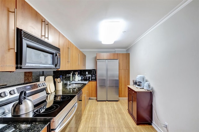 3001 S Ocean Dr Unit 1507, Hollywood, FL 33019 - kitchen featuring appliances with stainless steel finishes, tasteful backsplash, ornamental molding, and brown cabinetry