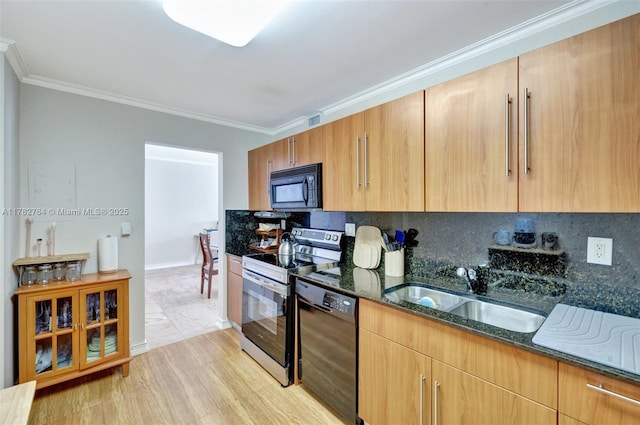 3001 S Ocean Dr Unit 1507, Hollywood, FL 33019 - kitchen featuring tasteful backsplash, dark stone counters, black appliances, ornamental molding, and a sink