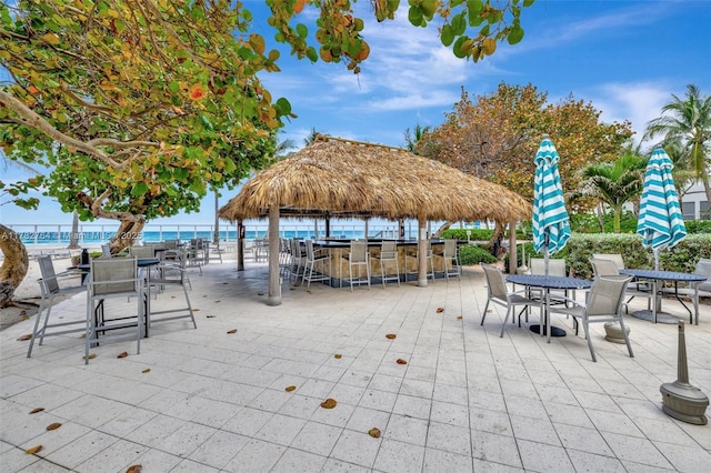 3001 S Ocean Dr Unit 1507, Hollywood, FL 33019 - view of patio with a gazebo, outdoor dry bar, a water view, and a view of the beach