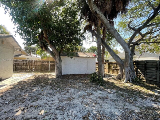 exterior space with a fenced backyard