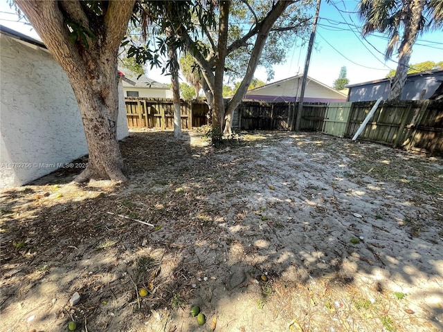 view of yard featuring a fenced backyard
