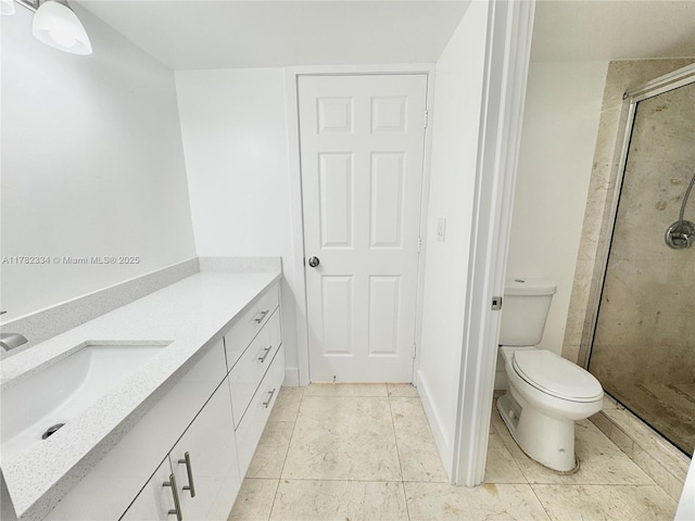 bathroom featuring tile patterned flooring, a shower stall, toilet, and vanity