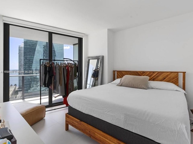 1300 S Miami Ave Unit 2001, Miami, FL 33130 - bedroom featuring multiple windows and expansive windows
