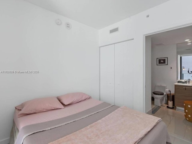1300 S Miami Ave Unit 2001, Miami, FL 33130 - bedroom with a closet and a sink