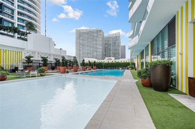 1300 S Miami Ave Unit 2001, Miami, FL 33130 - community pool featuring a city view and a patio area