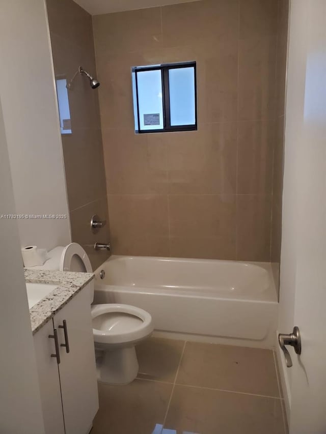 full bathroom with toilet, tile patterned floors, vanity, and shower / bath combination