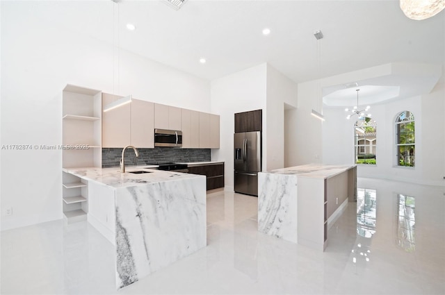 1807 Victoria Pointe Cir, Weston, FL 33327 - kitchen featuring open shelves, stainless steel appliances, modern cabinets, a sink, and backsplash