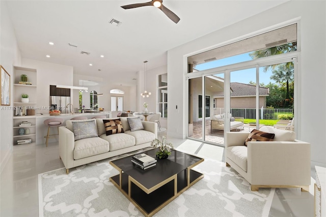 1807 Victoria Pointe Cir, Weston, FL 33327 - living area with ceiling fan, healthy amount of natural light, and recessed lighting