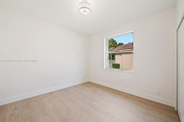 1807 Victoria Pointe Cir, Weston, FL 33327 - empty room with baseboards and wood finished floors