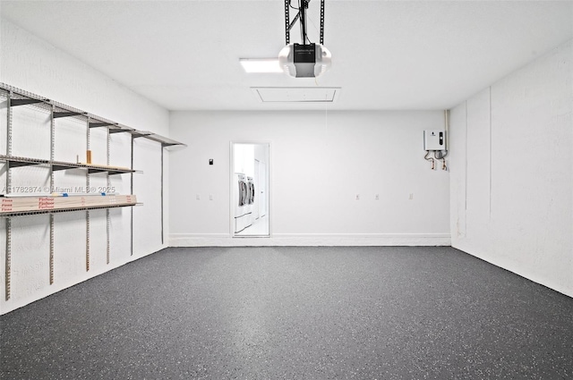 1807 Victoria Pointe Cir, Weston, FL 33327 - garage with a garage door opener, water heater, and washer / clothes dryer