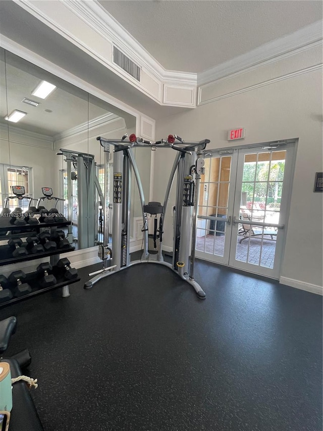 gym with crown molding, french doors, baseboards, and visible vents