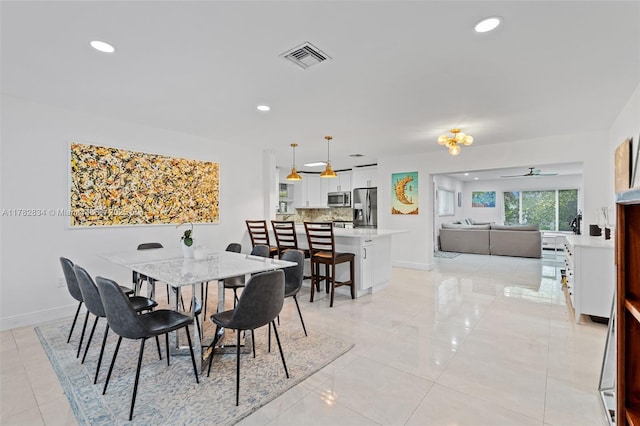 dining space featuring visible vents, baseboards, a ceiling fan, and recessed lighting
