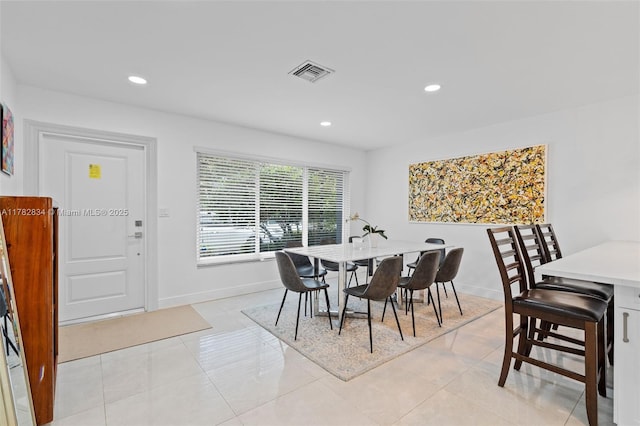 dining space featuring recessed lighting, visible vents, baseboards, and light tile patterned flooring