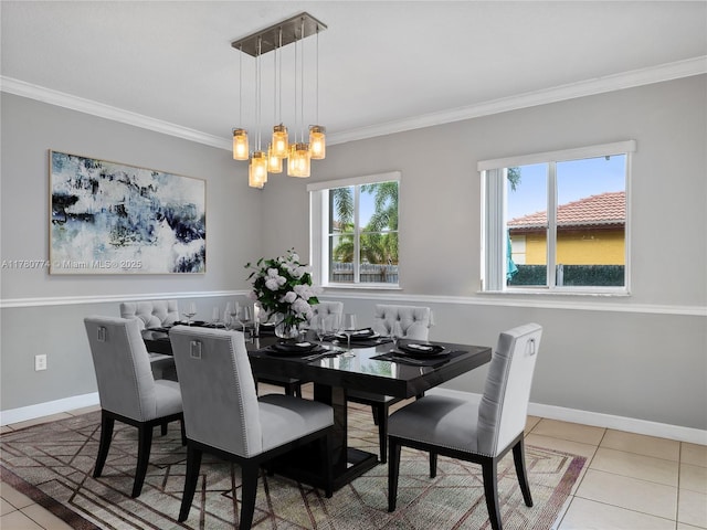 4173 NE 12th St, Homestead, FL 33033 - tiled dining space with a notable chandelier, ornamental molding, and baseboards