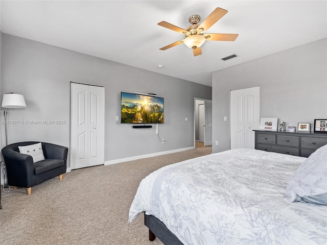 4173 NE 12th St, Homestead, FL 33033 - bedroom featuring baseboards, carpet flooring, visible vents, multiple closets, and ceiling fan