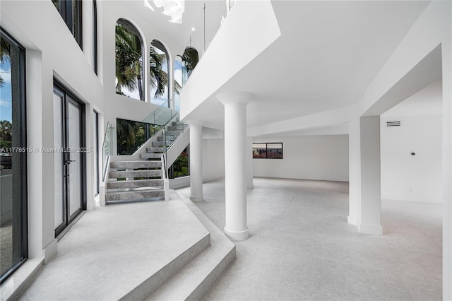3321 NE 16th Pl, Fort Lauderdale, FL 33305 - unfurnished living room with recessed lighting, french doors, and baseboards