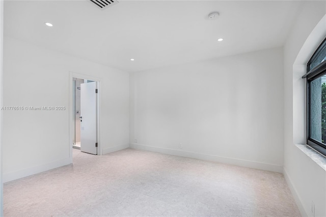3321 NE 16th Pl, Fort Lauderdale, FL 33305 - spare room featuring recessed lighting, baseboards, light carpet, and a smoke detector