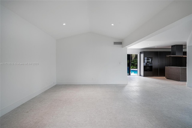 3321 NE 16th Pl, Fort Lauderdale, FL 33305 - unfurnished living room with recessed lighting and lofted ceiling