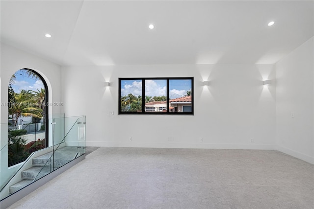3321 NE 16th Pl, Fort Lauderdale, FL 33305 - spare room featuring recessed lighting, baseboards, and carpet