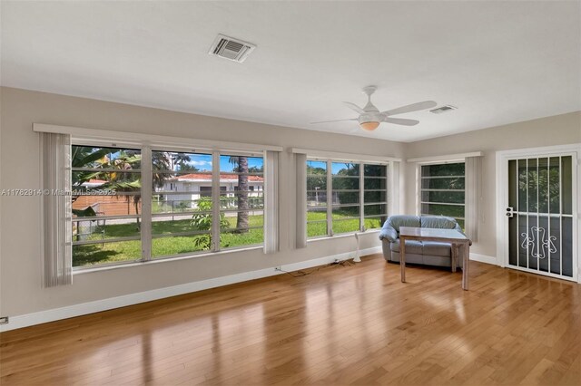 sunroom featuring visible vents