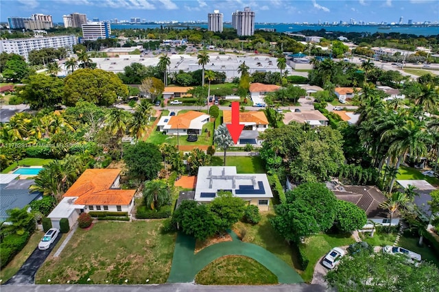 birds eye view of property featuring a city view