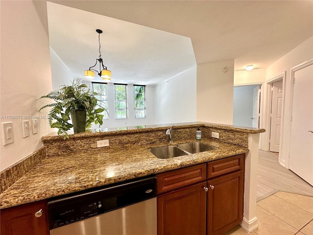 3001 NE 185th St Unit 336, Aventura, FL 33180 - kitchen with dark stone countertops, light tile patterned floors, stainless steel dishwasher, pendant lighting, and a sink