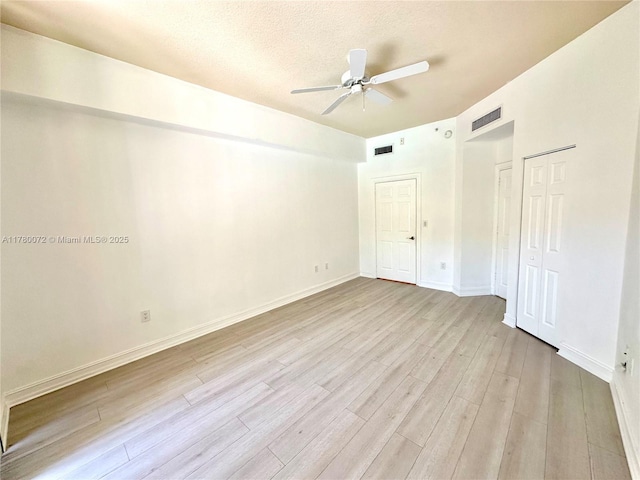 3001 NE 185th St Unit 336, Aventura, FL 33180 - unfurnished bedroom with ceiling fan, visible vents, baseboards, and light wood-style flooring