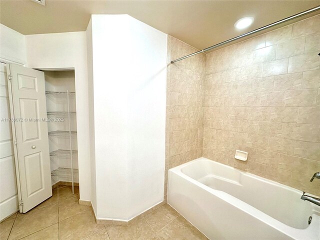 3001 NE 185th St Unit 336, Aventura, FL 33180 - bathroom with recessed lighting, tile patterned flooring, shower / tub combination, and baseboards
