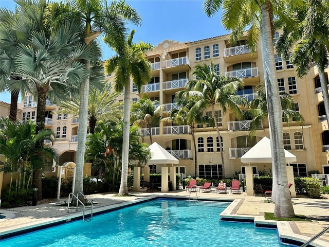 3001 NE 185th St Unit 336, Aventura, FL 33180 - community pool featuring a patio area