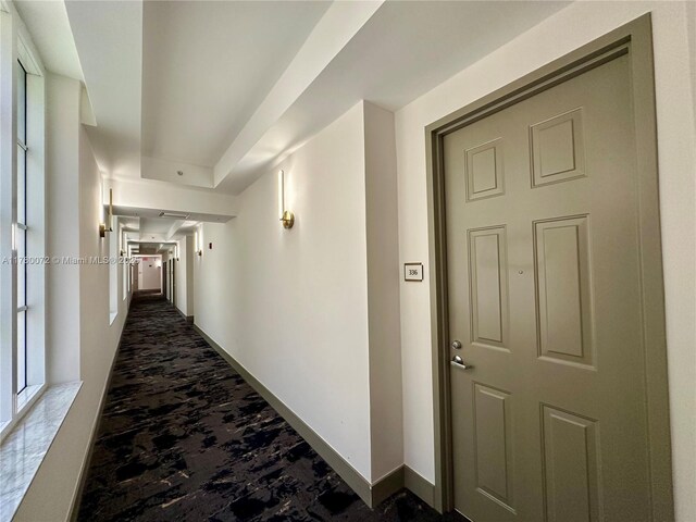 3001 NE 185th St Unit 336, Aventura, FL 33180 - hallway featuring baseboards