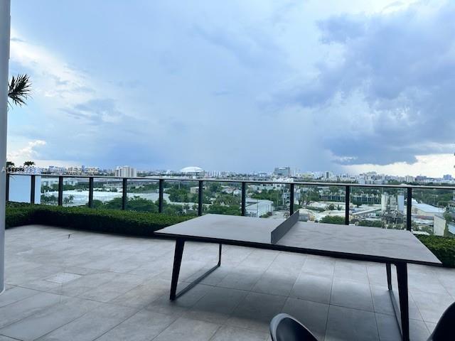 balcony featuring a view of city