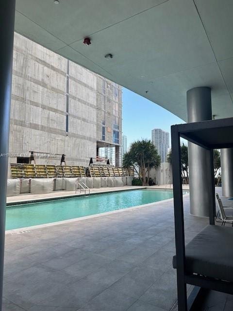 pool featuring a patio