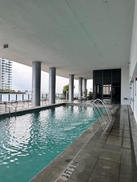 community pool featuring a patio