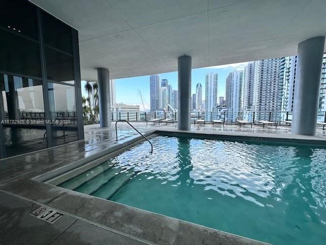 community pool featuring a view of city
