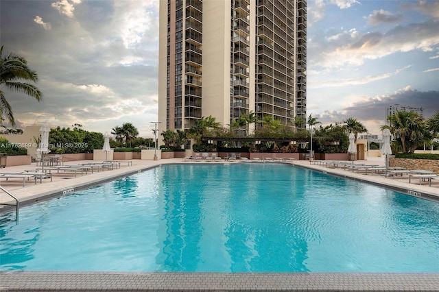 community pool featuring a patio area