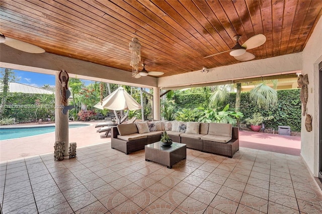 view of patio / terrace with an outdoor living space, an outdoor pool, and ceiling fan