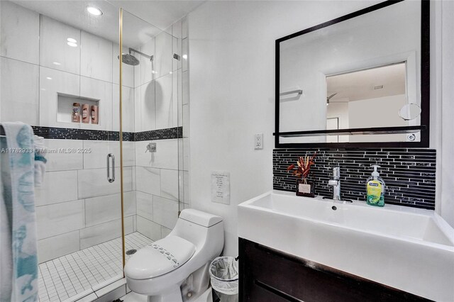 full bath with vanity, recessed lighting, backsplash, toilet, and a shower stall