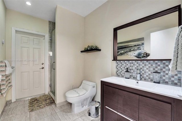 bathroom featuring toilet, tasteful backsplash, vanity, and a shower stall