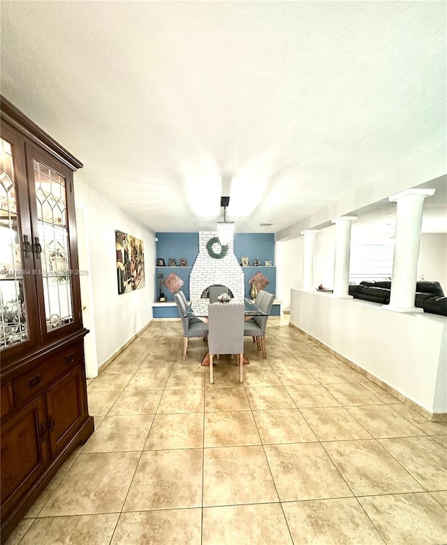dining room featuring light tile patterned floors