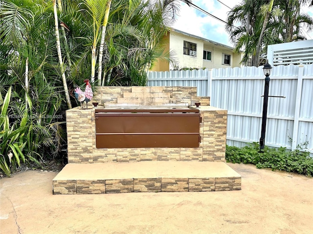 view of patio / terrace with fence