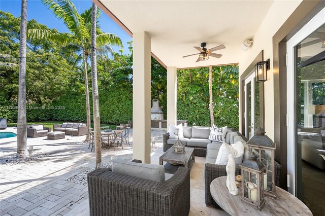 31 Island Dr, Key Biscayne, FL 33149 - view of patio with outdoor lounge area and a ceiling fan