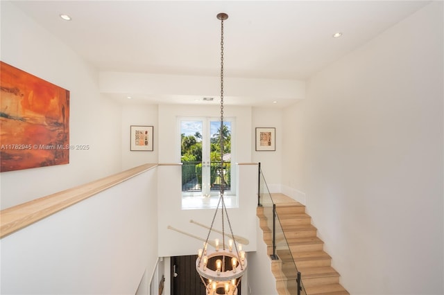 31 Island Dr, Key Biscayne, FL 33149 - hallway with an upstairs landing, light wood-style flooring, and recessed lighting