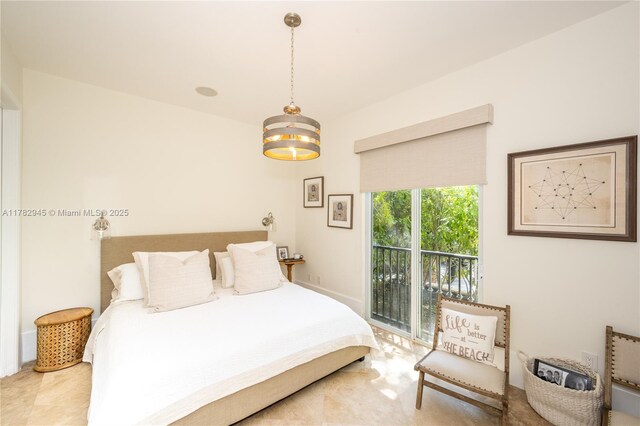 31 Island Dr, Key Biscayne, FL 33149 - bedroom featuring access to outside and a chandelier