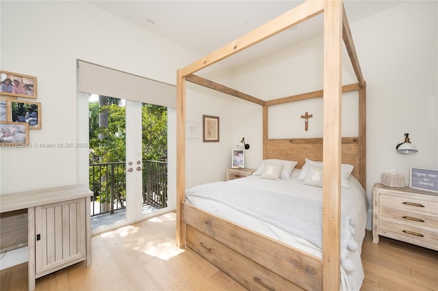 31 Island Dr, Key Biscayne, FL 33149 - bedroom featuring access to outside, french doors, and light wood-style floors