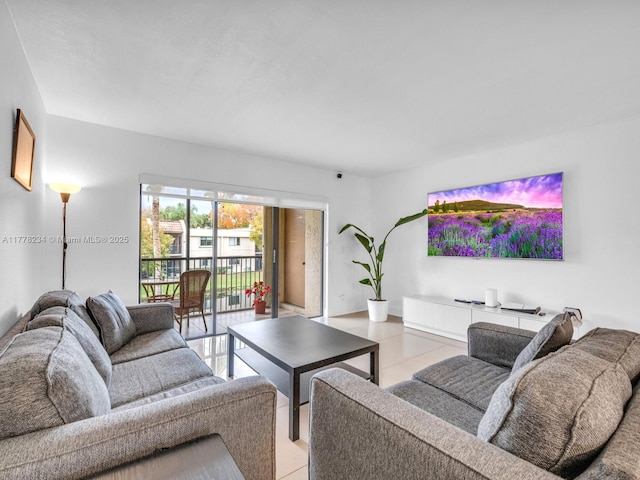 living area with light tile patterned floors