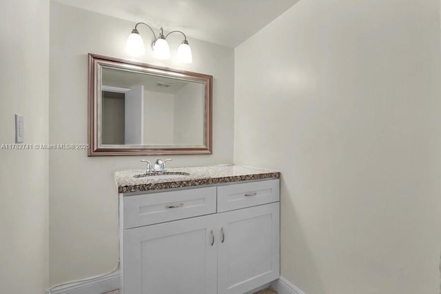 9050 NW 28th St Unit 114, Coral Springs, FL 33065 - bathroom featuring vanity and baseboards