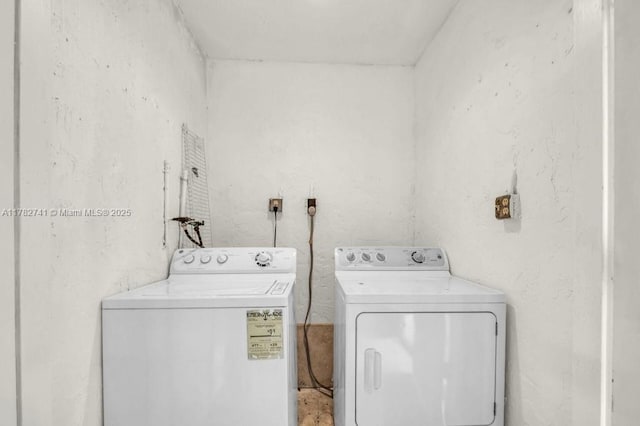 9050 NW 28th St Unit 114, Coral Springs, FL 33065 - washroom with washing machine and clothes dryer