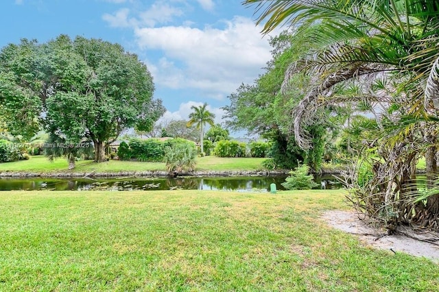 9050 NW 28th St Unit 114, Coral Springs, FL 33065 - view of green lawn with a water view