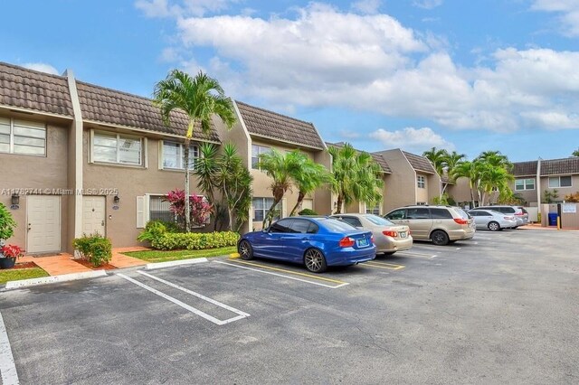9050 NW 28th St Unit 114, Coral Springs, FL 33065 - view of uncovered parking lot